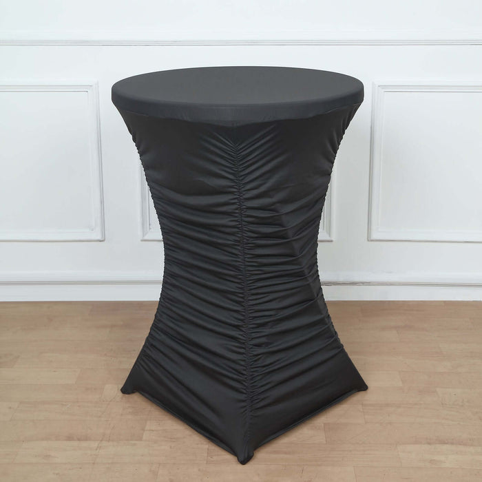 Black stretch table cover for cocktail tables, perfect for events and gatherings.