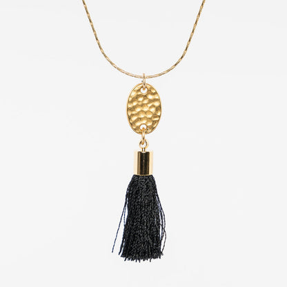 up close of the multi-strand tassel necklace by near and native