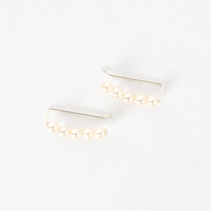 top view of the ivory pearl ear climbers - handmade in maine - jewelry - elegant earrings