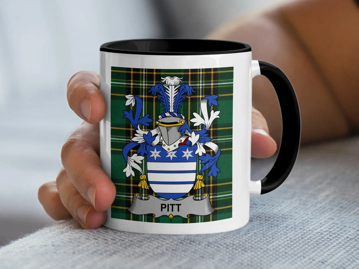 Mug with Pitt family crest on a plaid background.